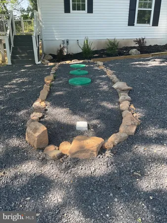 a front view of a house with yard