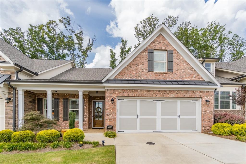 5660 Overlook Club Circle Suwanee, GA 30024 - Photo 1 of 1 front view of a house with a yard