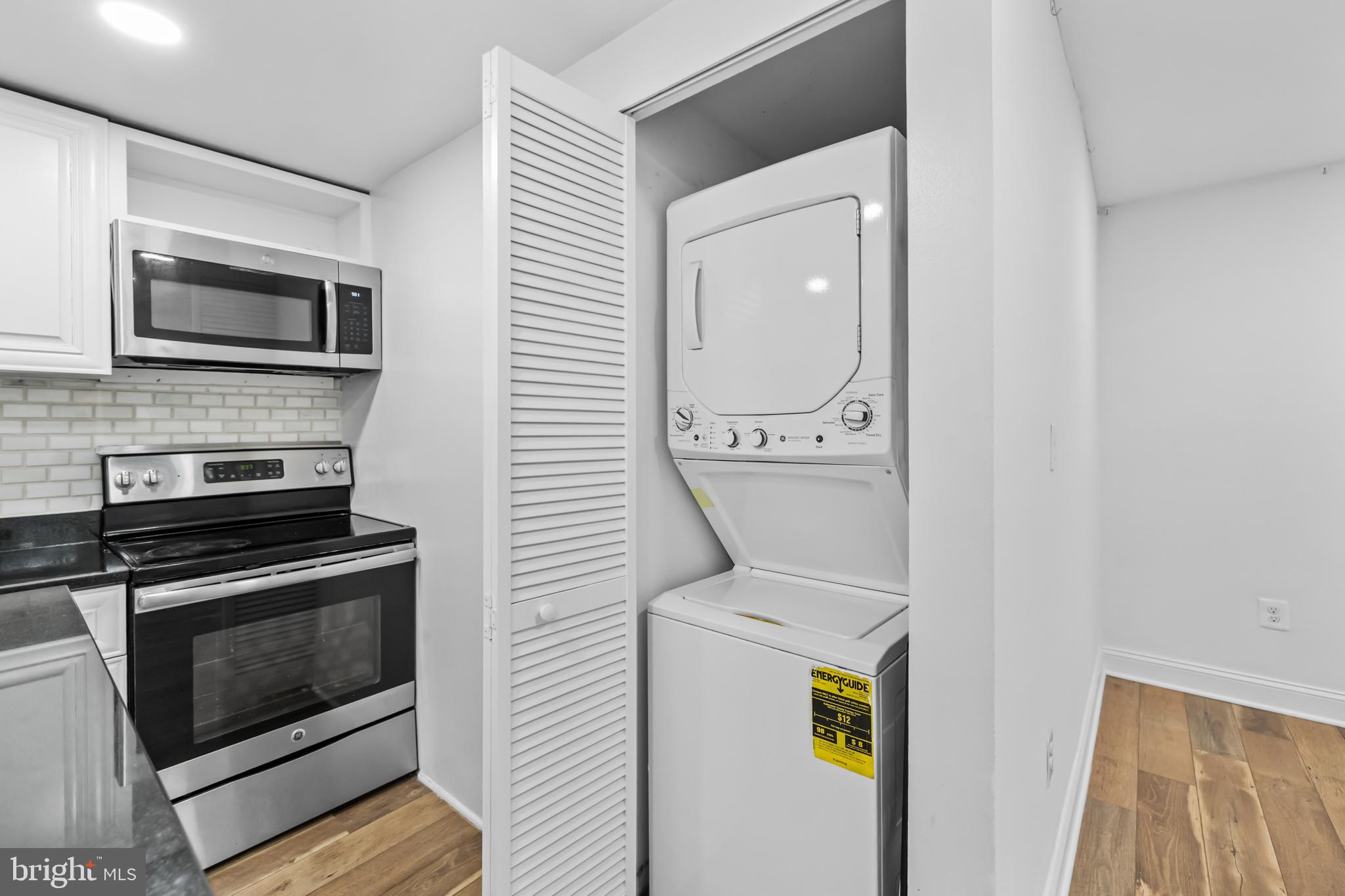 2032 15th Street Northwest, Unit 2 Washington, DC 20009 - Photo 13 of 28 a utility room with dryer and washer