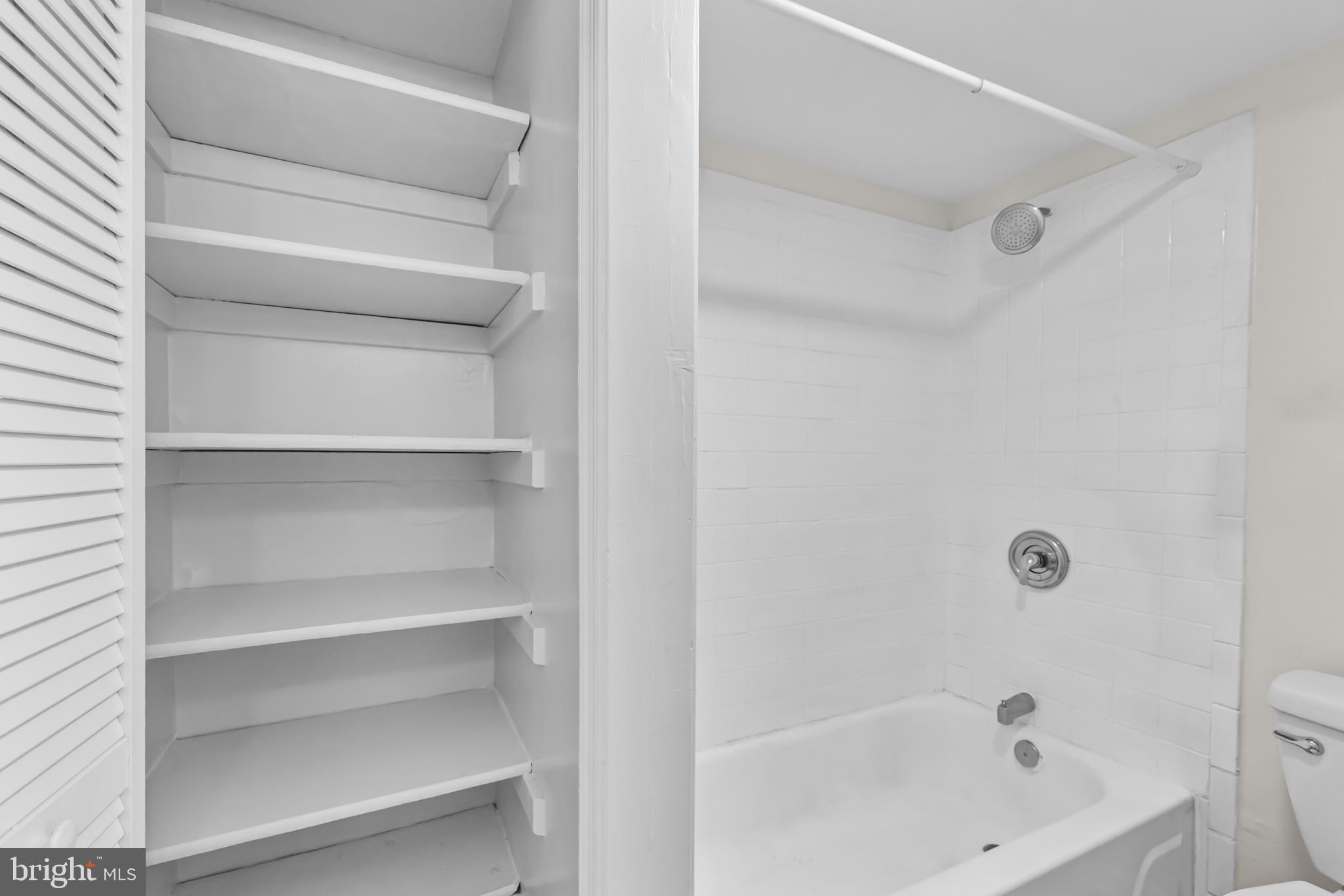 2032 15th Street Northwest, Unit 2 Washington, DC 20009 - Photo 16 of 28 a bathroom with a bathtub