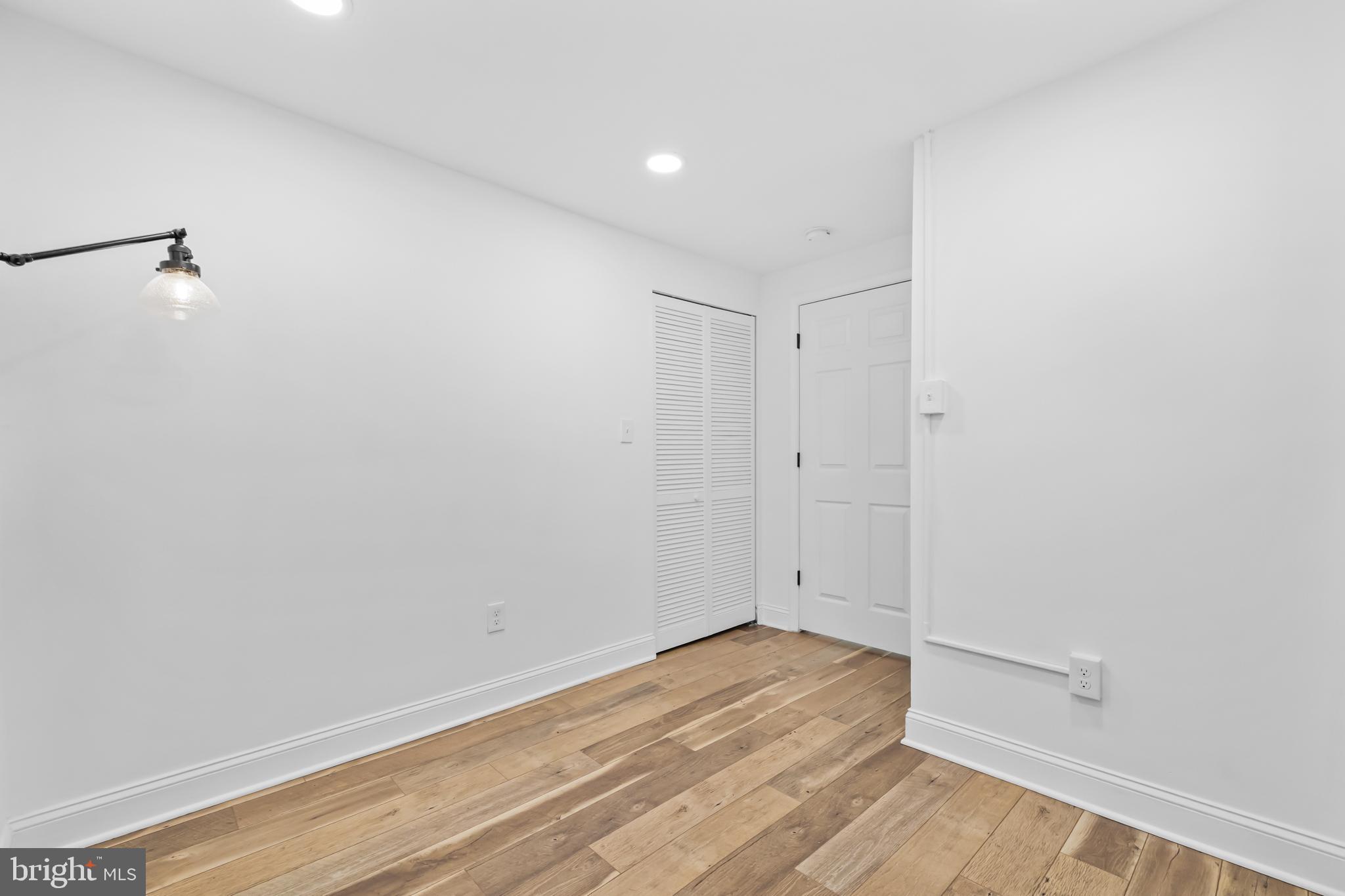 2032 15th Street Northwest, Unit 2 Washington, DC 20009 - Photo 21 of 28 a view of a room with wooden floor