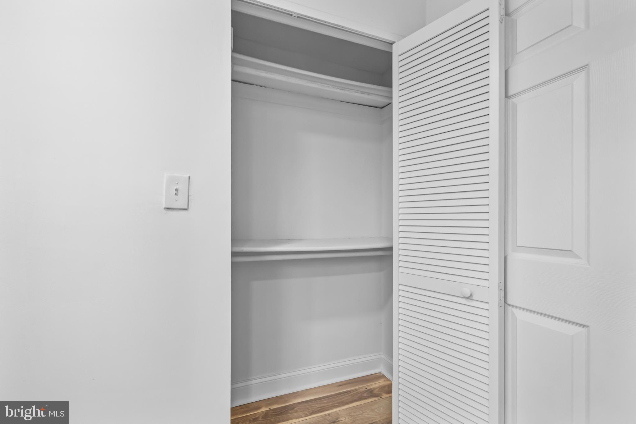 2032 15th Street Northwest, Unit 2 Washington, DC 20009 - Photo 22 of 28 a view of walk in closet with empty racks
