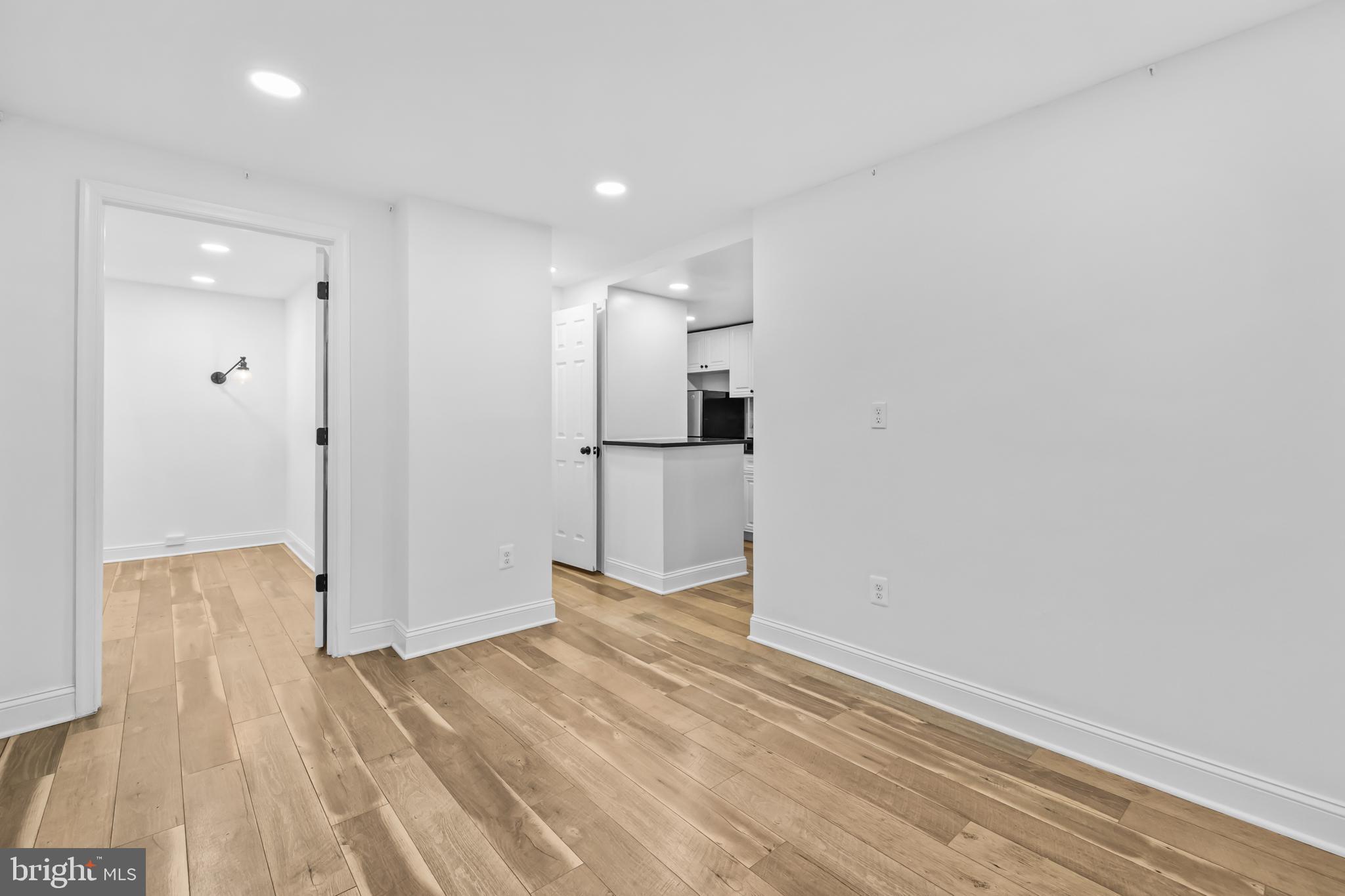 2032 15th Street Northwest, Unit 2 Washington, DC 20009 - Photo 7 of 28 a view of a livingroom with wooden floor