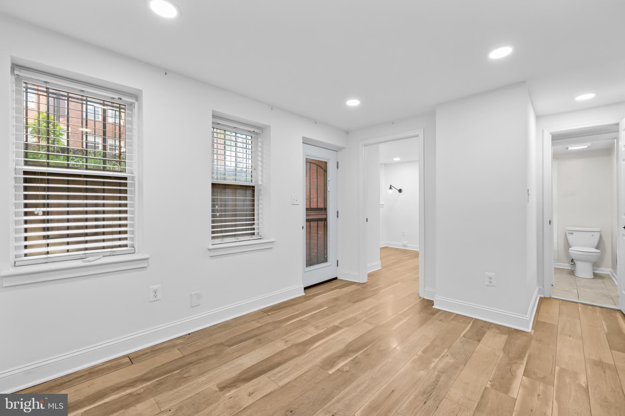 2032 15th Street Northwest, Unit 2 Washington, DC 20009 - Photo 8 of 28 a view of empty room with wooden floor and fan