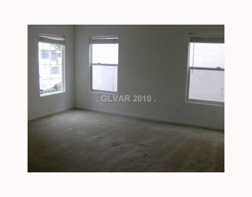 8935 Argus Reed Avenue Las Vegas, NV 89148 - Photo 3 of 9 Living Room.