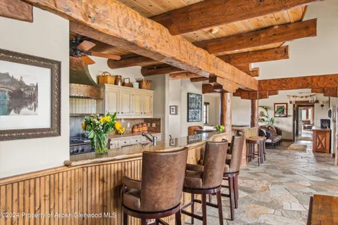 a view of an outdoor dining space with furniture