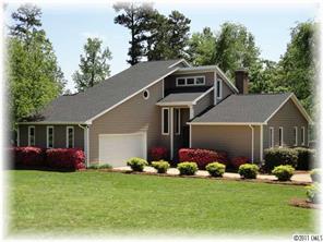 8406 Fairfield Forest Road Denver, NC 28037 - Photo 1 of 16 a front view of house with yard and green space