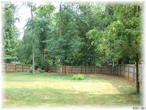 8406 Fairfield Forest Road Denver, NC 28037 - Photo 13 of 16 a view of swimming pool with a bench in a backyard