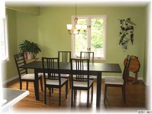 8406 Fairfield Forest Road Denver, NC 28037 - Photo 7 of 16 a view of a dining room with furniture and window