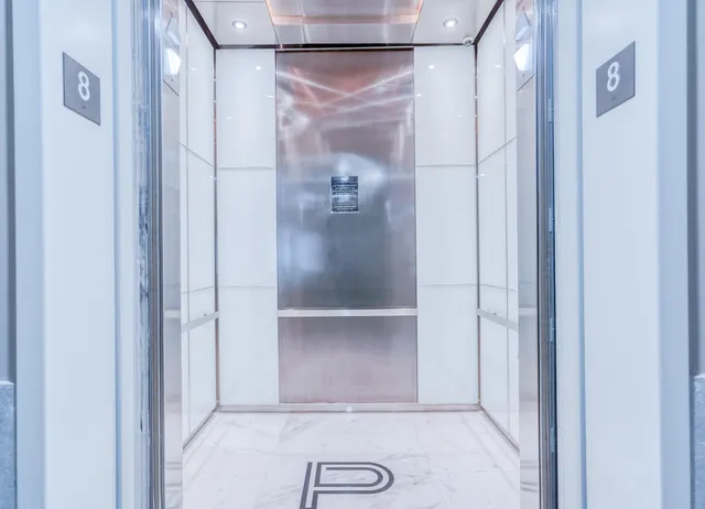 a view of a building with a street