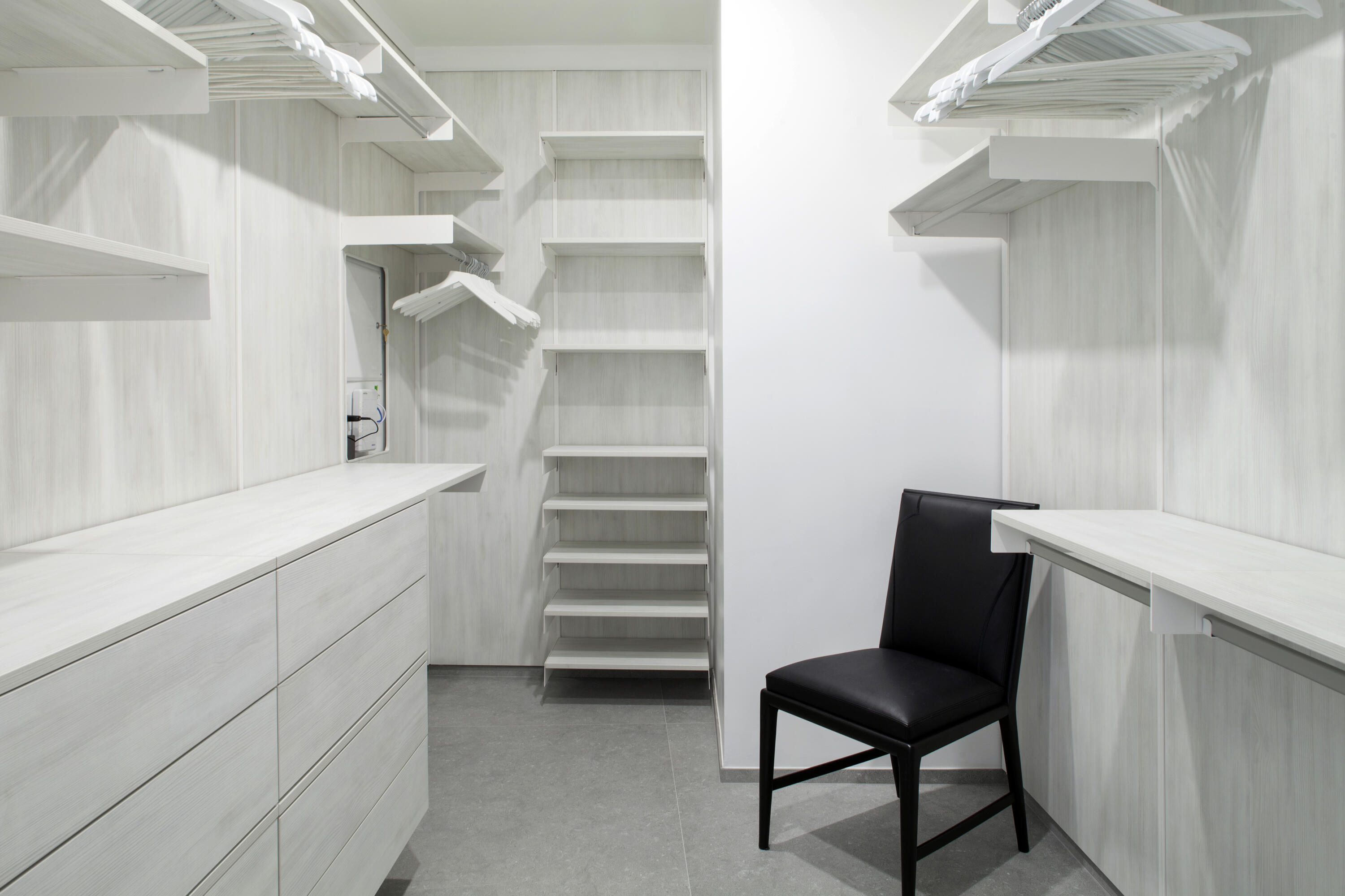 851 Northeast 1st Avenue, Unit 812 Miami, FL 33132 - Photo 39 of 84 a view of walk in closet with empty racks