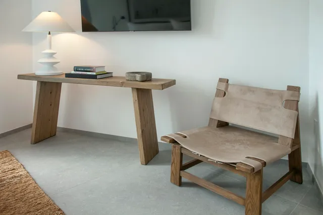 a view of a brick house with a large windows