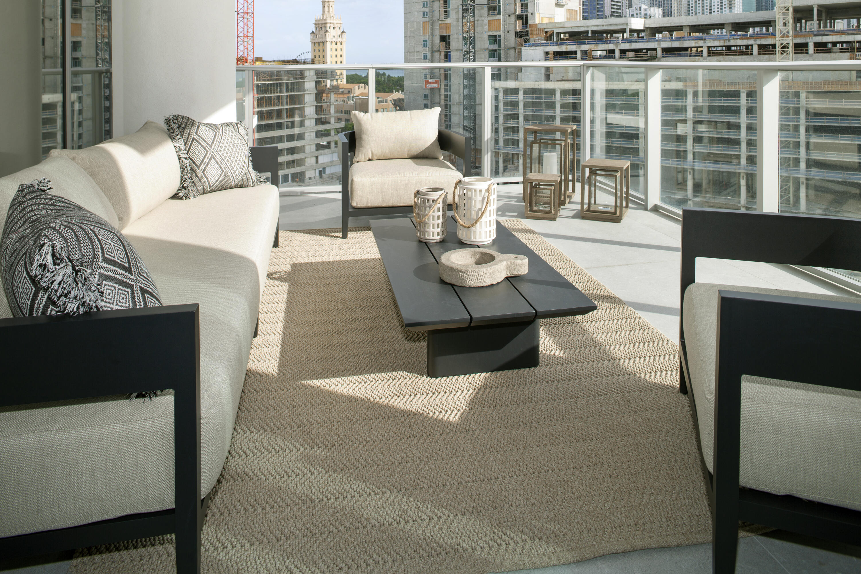 851 Northeast 1st Avenue, Unit 812 Miami, FL 33132 - Photo 44 of 84 a living room with furniture and a floor to ceiling window