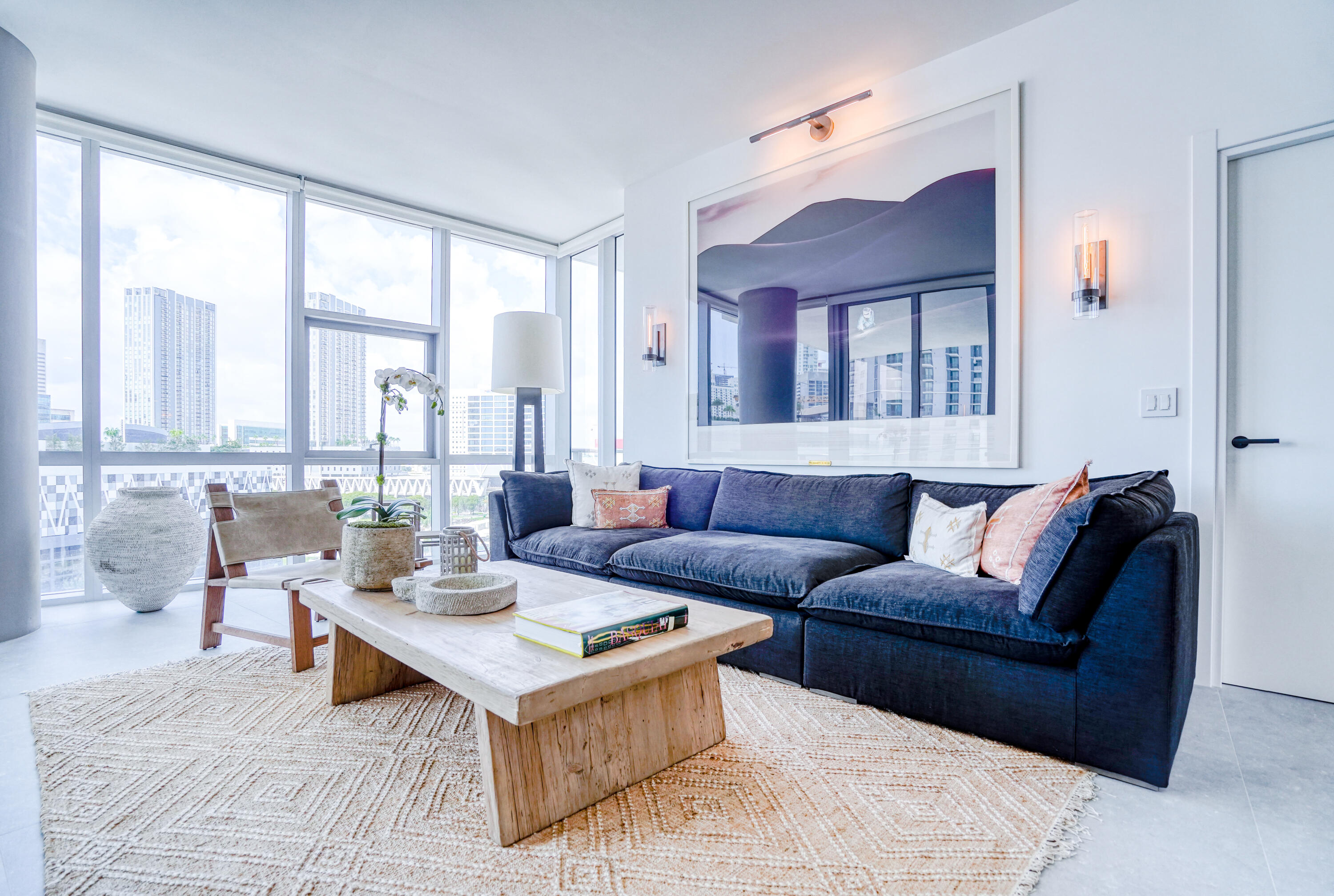 851 Northeast 1st Avenue, Unit 812 Miami, FL 33132 - Photo 47 of 84 a living room with furniture and large windows