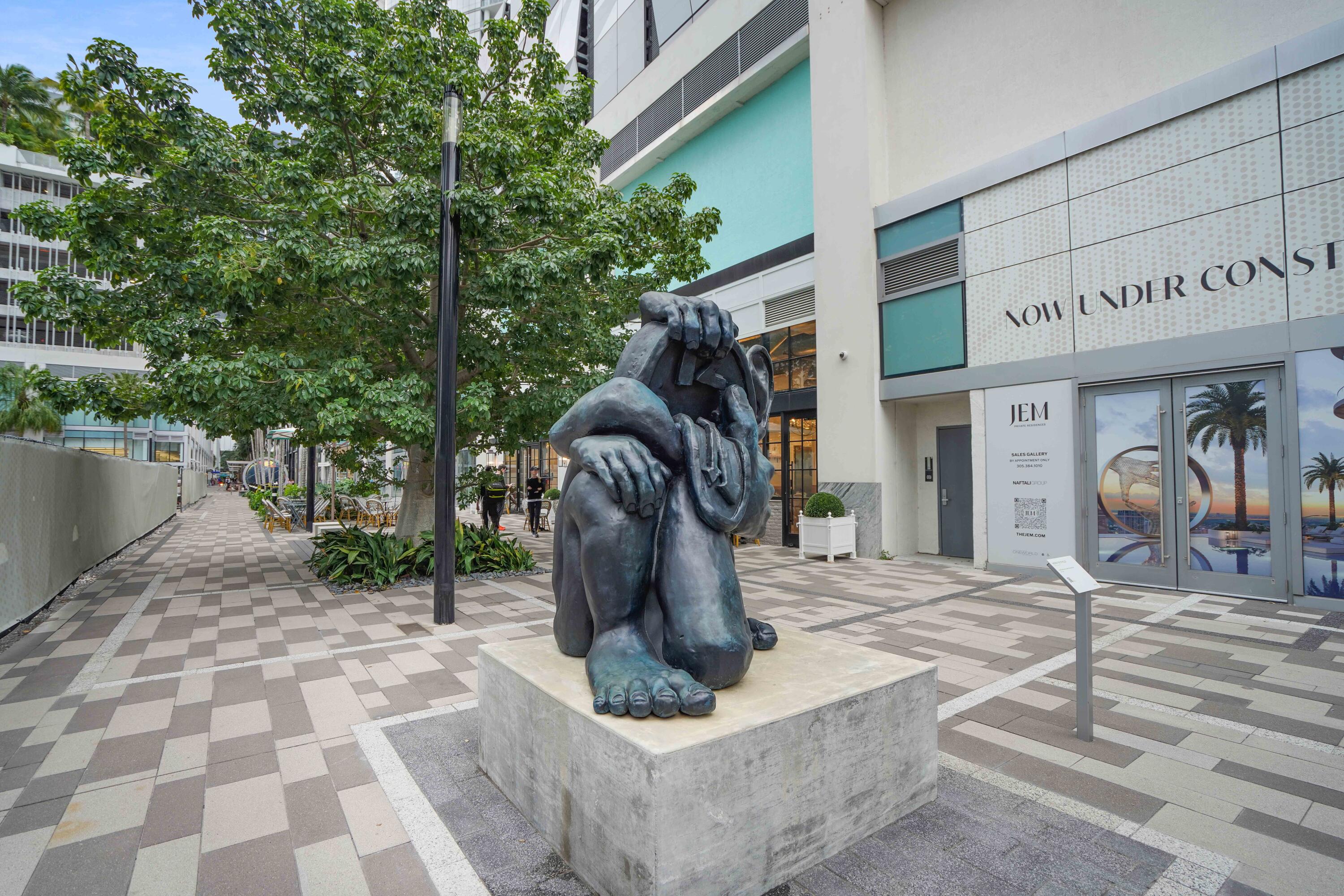 851 Northeast 1st Avenue, Unit 812 Miami, FL 33132 - Photo 69 of 84 a view of a dinning tables and chair in the patio