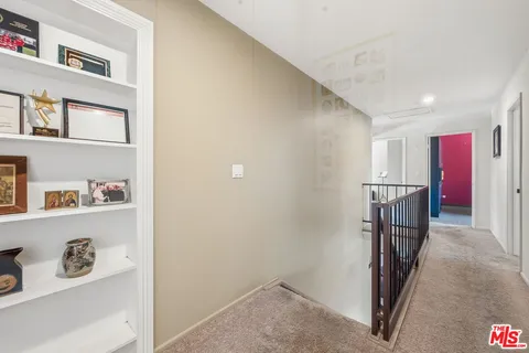 a view of entryway with stairs