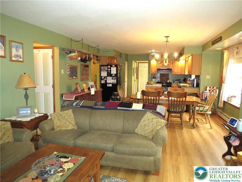477 Quiet Valley Road Mount Bethel, PA 18343 - Photo 30 of 53 Blends kitchen and living areas for cohesive entertaining and daily routines.