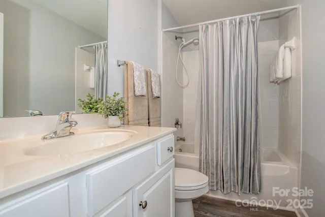 a view of a garden with an outdoor seating