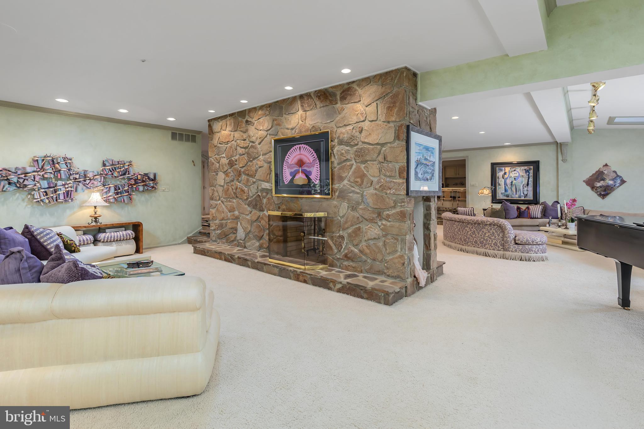 533 Heartwood Road Cherry Hill, NJ 08003 - Photo 11 of 55 a living room with furniture and a flat screen tv