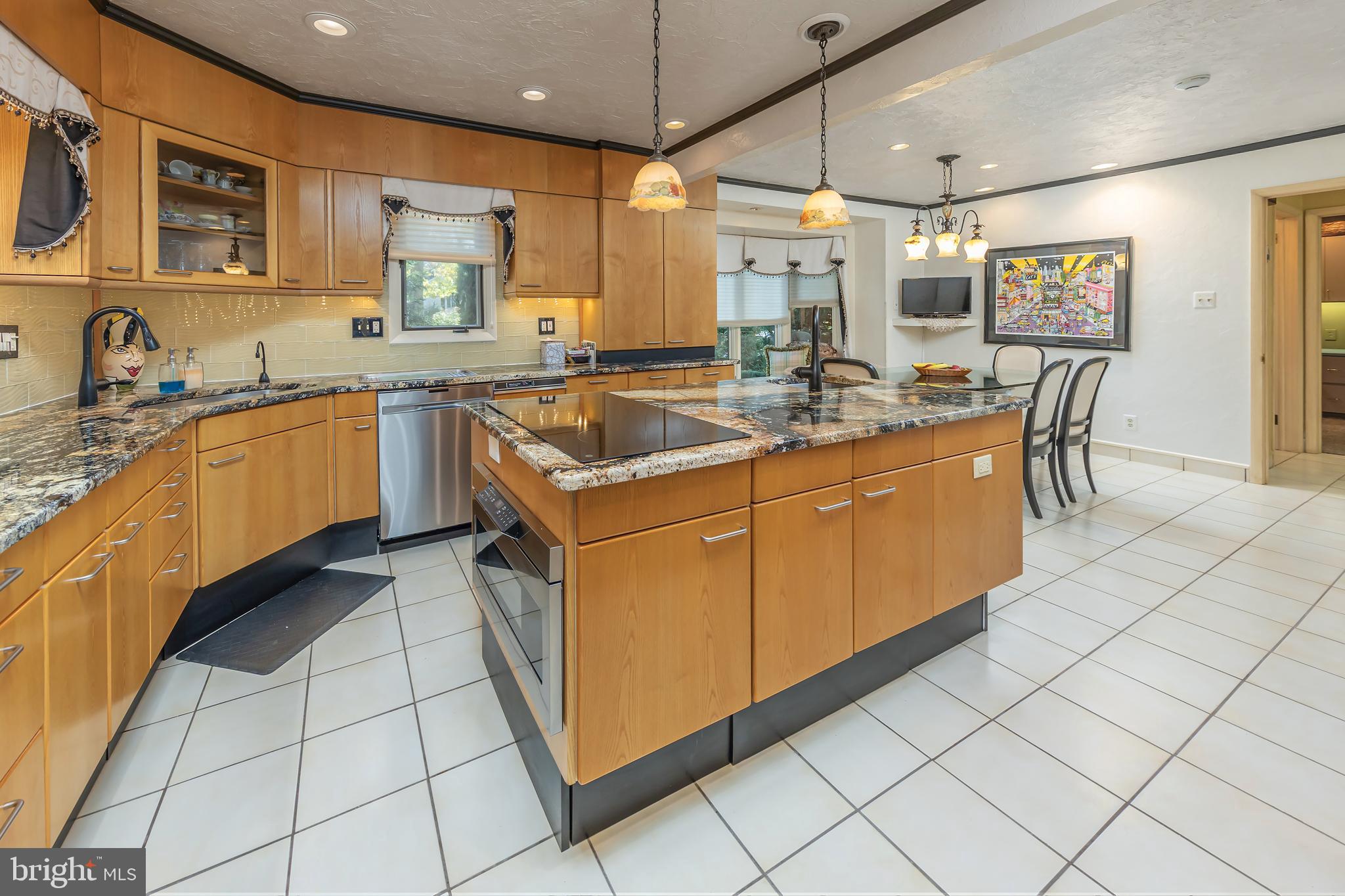 533 Heartwood Road Cherry Hill, NJ 08003 - Photo 18 of 55 a kitchen with stainless steel appliances granite countertop a sink and cabinets