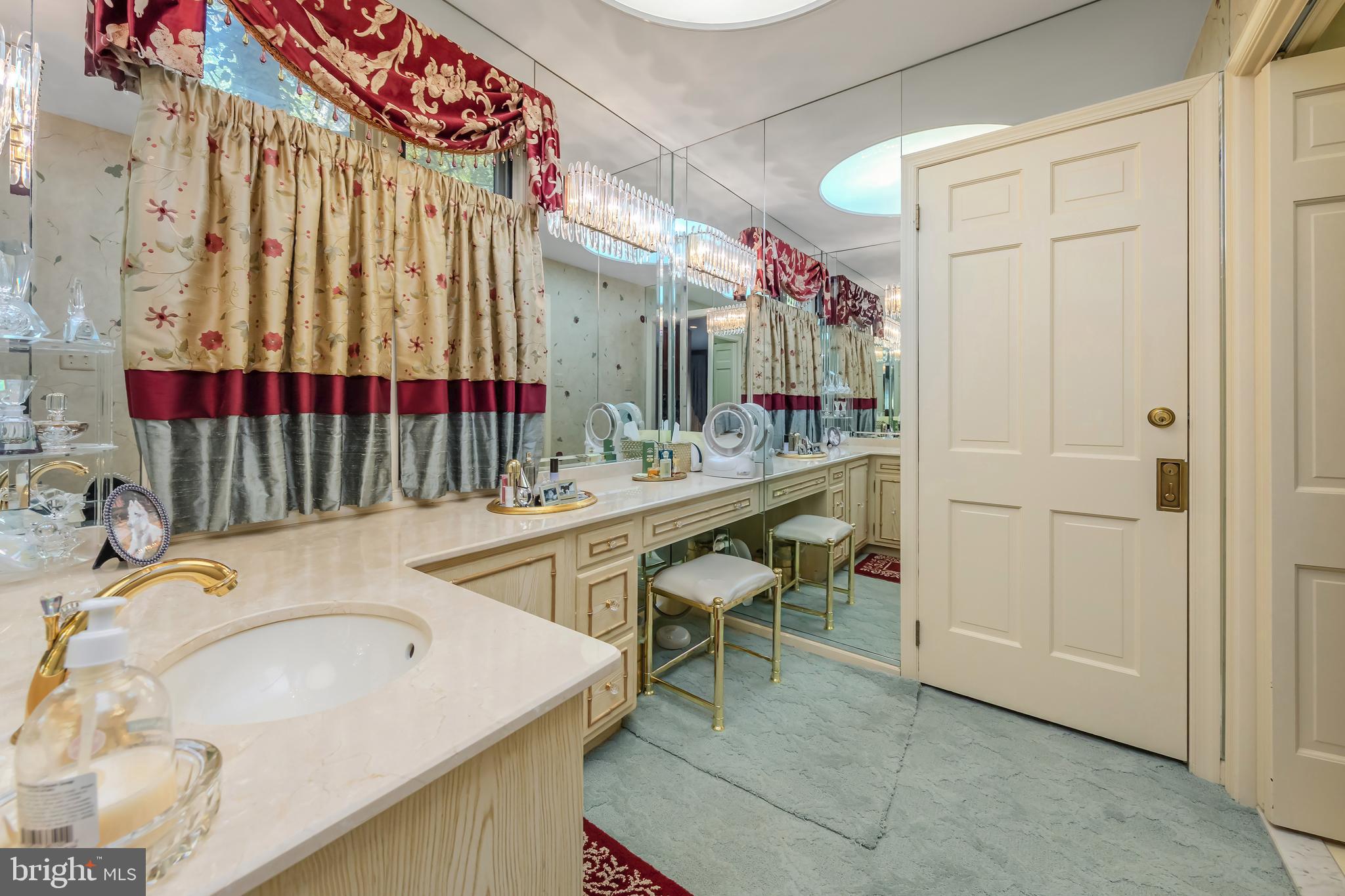533 Heartwood Road Cherry Hill, NJ 08003 - Photo 32 of 55 a bathroom with a sink and a mirror