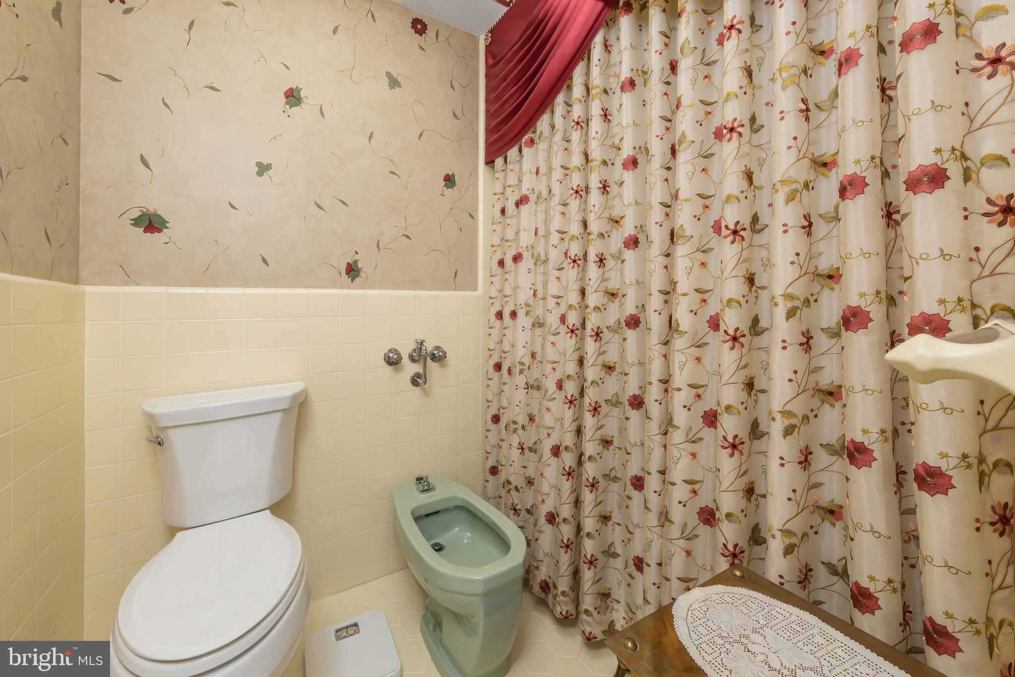 533 Heartwood Road Cherry Hill, NJ 08003 - Photo 33 of 55 a white toilet sitting next to a shower curtain