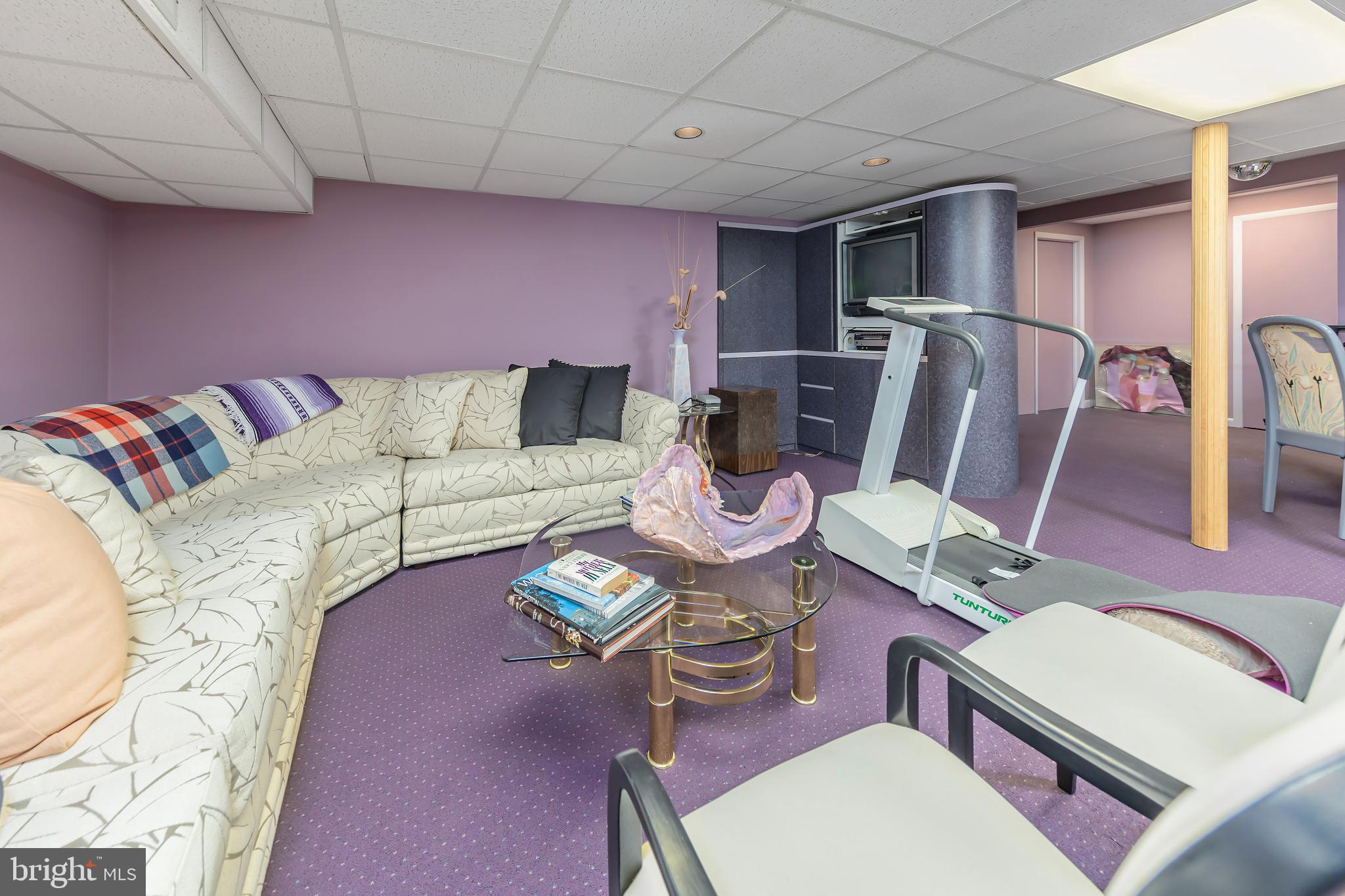 533 Heartwood Road Cherry Hill, NJ 08003 - Photo 42 of 55 a living room with furniture a flat screen tv and rug