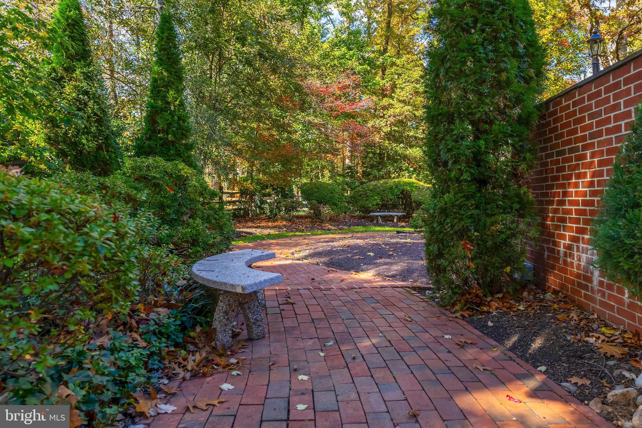 533 Heartwood Road Cherry Hill, NJ 08003 - Photo 45 of 55 a view of a backyard with plants and a patio
