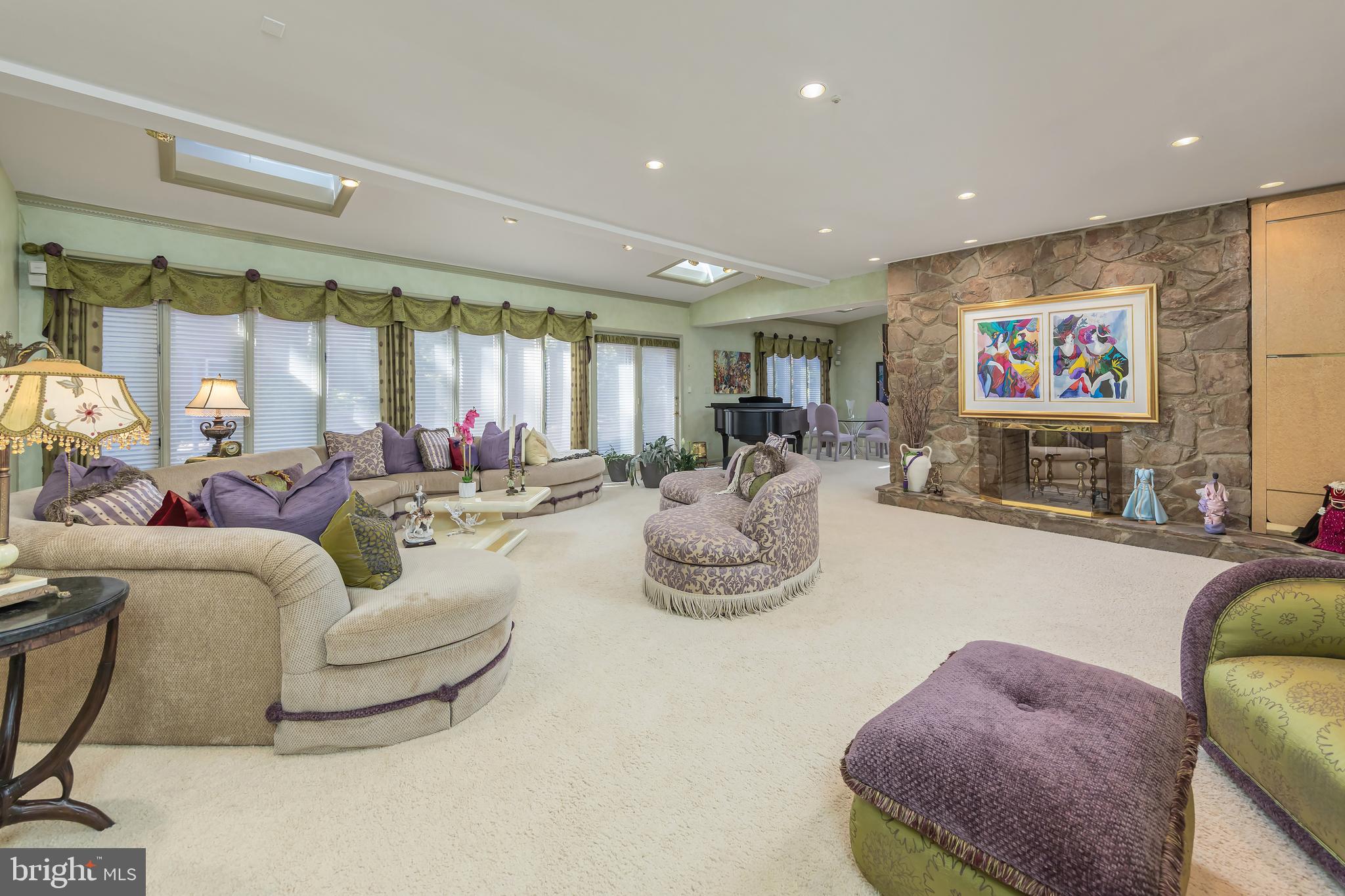 533 Heartwood Road Cherry Hill, NJ 08003 - Photo 5 of 55 a living room with furniture and a flat screen tv