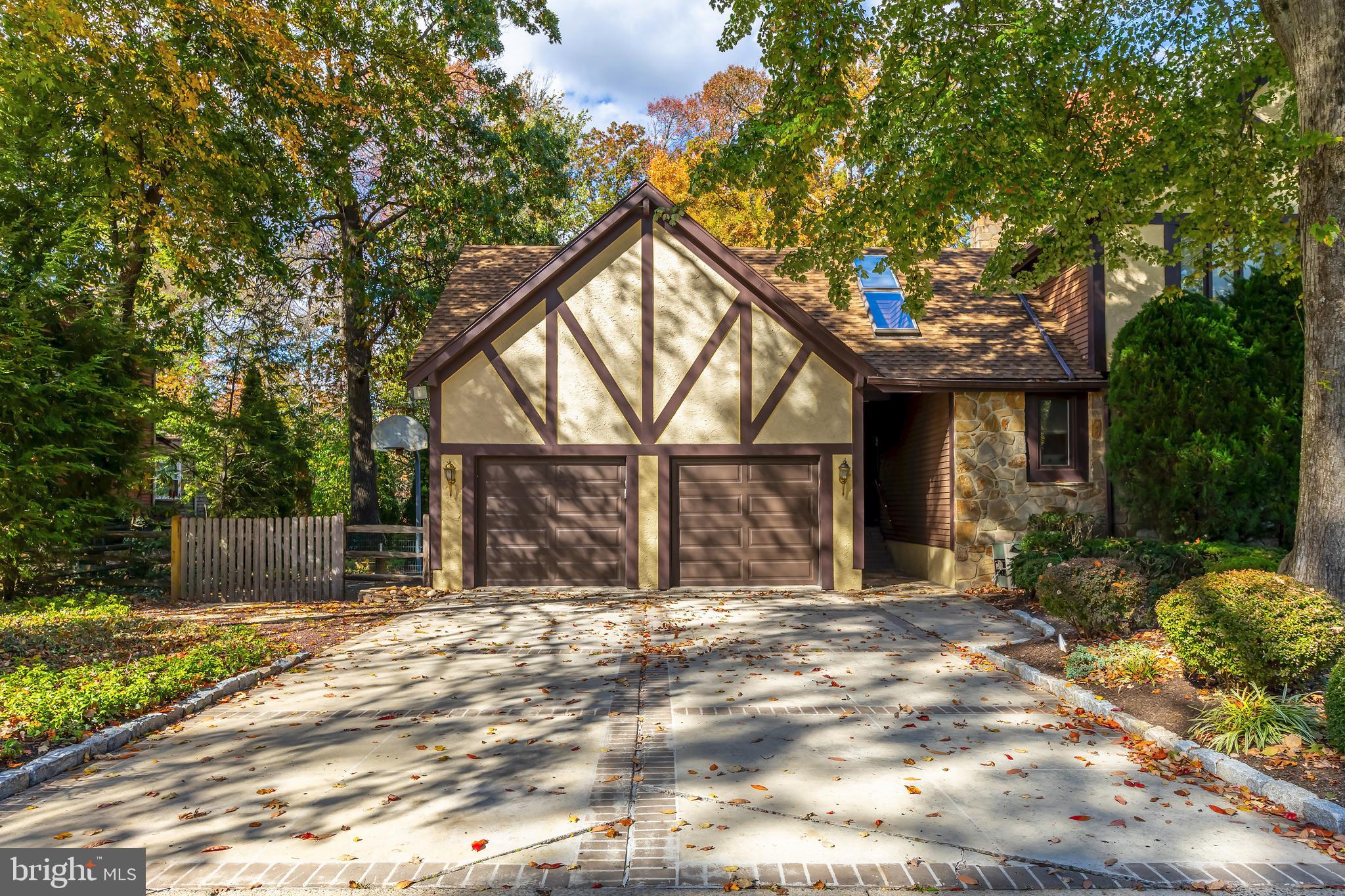 533 Heartwood Road Cherry Hill, NJ 08003 - Photo 51 of 55 a backyard of a house with large trees and outdoor seating