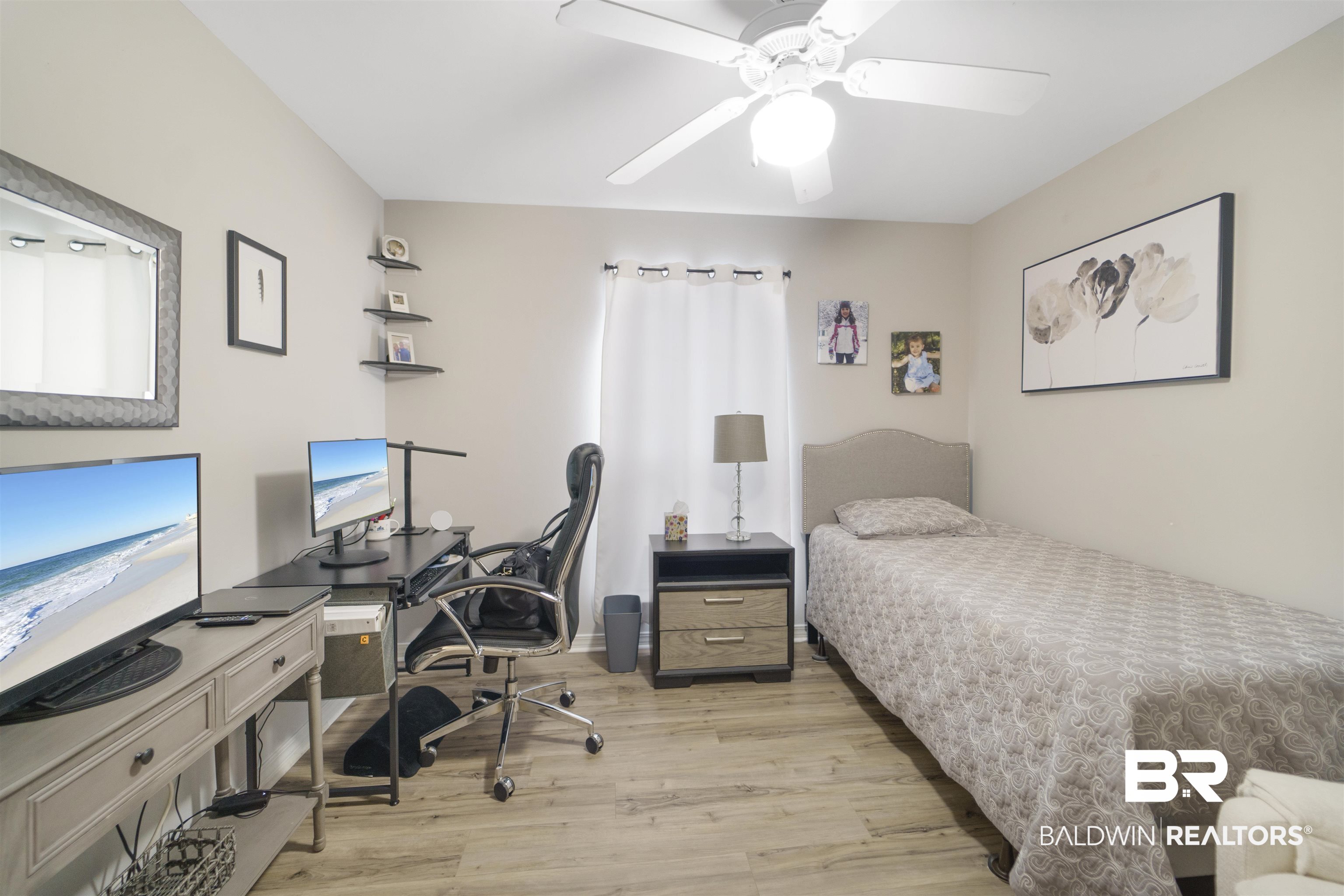 4620 Pine Boulevard Orange Beach, AL 36561 - Photo 23 of 49 Bedroom featuring light wood-style floors, a desk, and ceiling fan