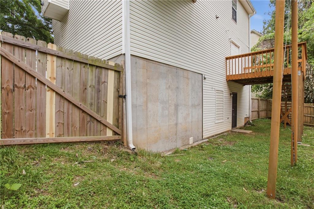 5855 Crescent Ridge Court Lithonia, GA 30058 - Photo 42 of 46 a view of a house with backyard and deck