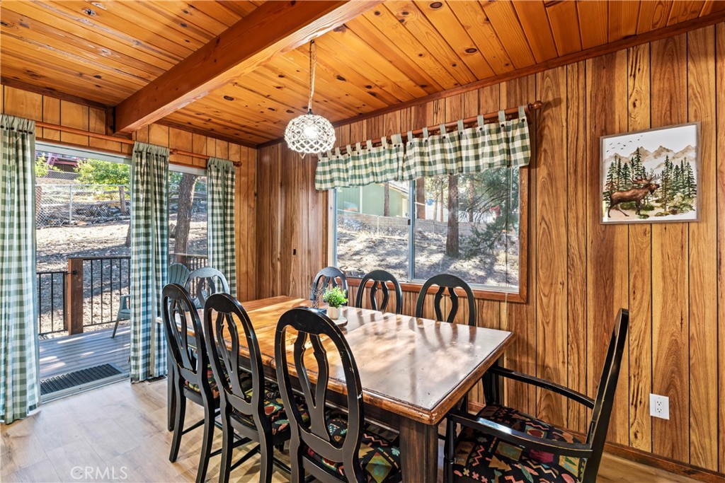 930 Bear Mountain Road Big Bear City, CA 92314 - Photo 12 of 39 a view of a patio with a table and chairs