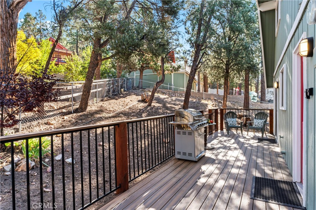 930 Bear Mountain Road Big Bear City, CA 92314 - Photo 14 of 39 a view of a chairs and table in the balcony