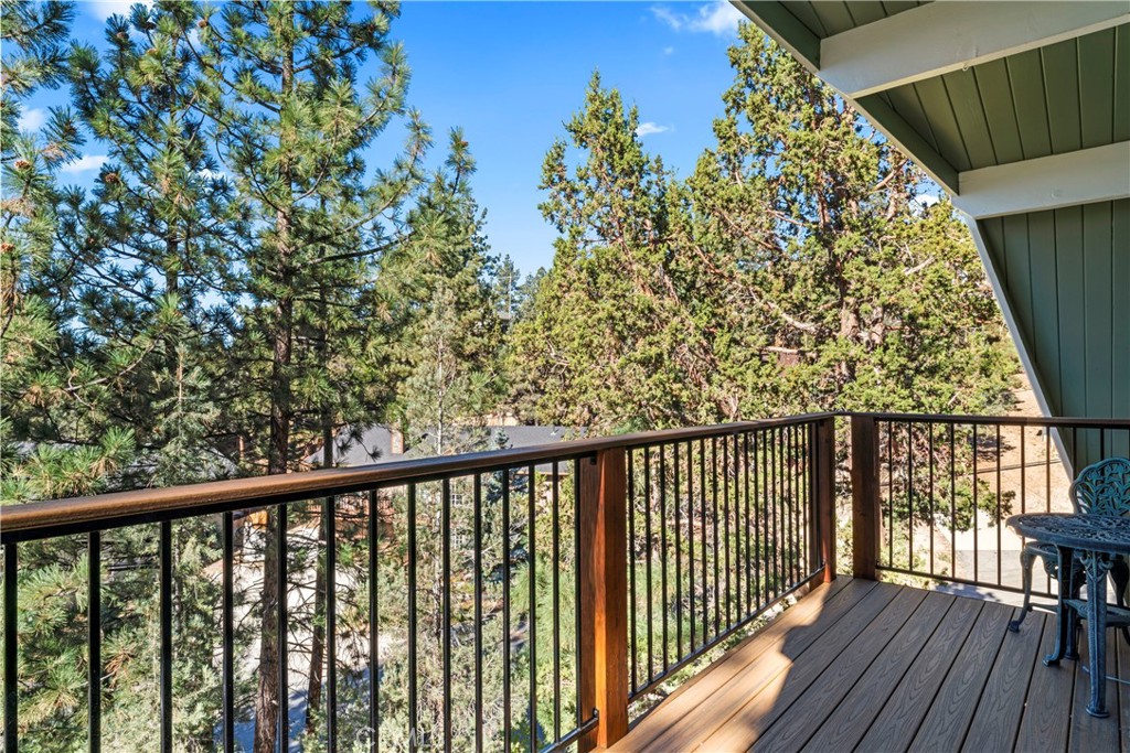 930 Bear Mountain Road Big Bear City, CA 92314 - Photo 21 of 39 a view of balcony with wooden floor