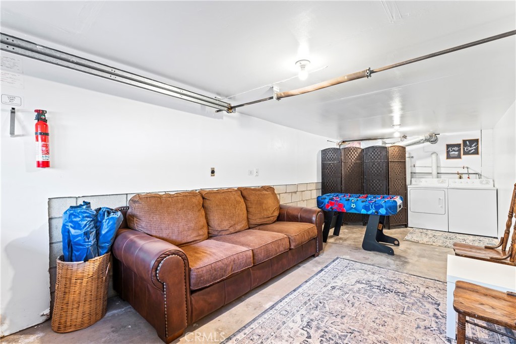 930 Bear Mountain Road Big Bear City, CA 92314 - Photo 31 of 39 a living room with furniture and a couch