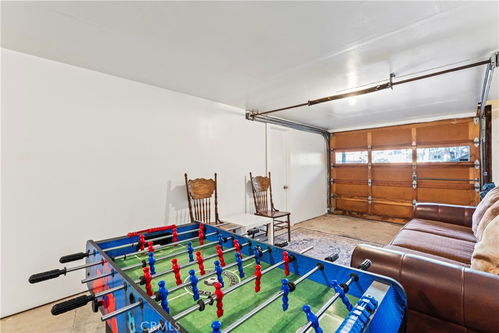 930 Bear Mountain Road Big Bear City, CA 92314 - Photo 32 of 39 a bedroom with bed and a window