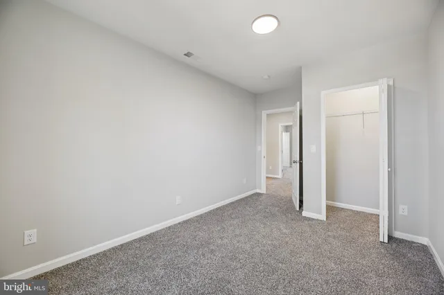 an empty room with window