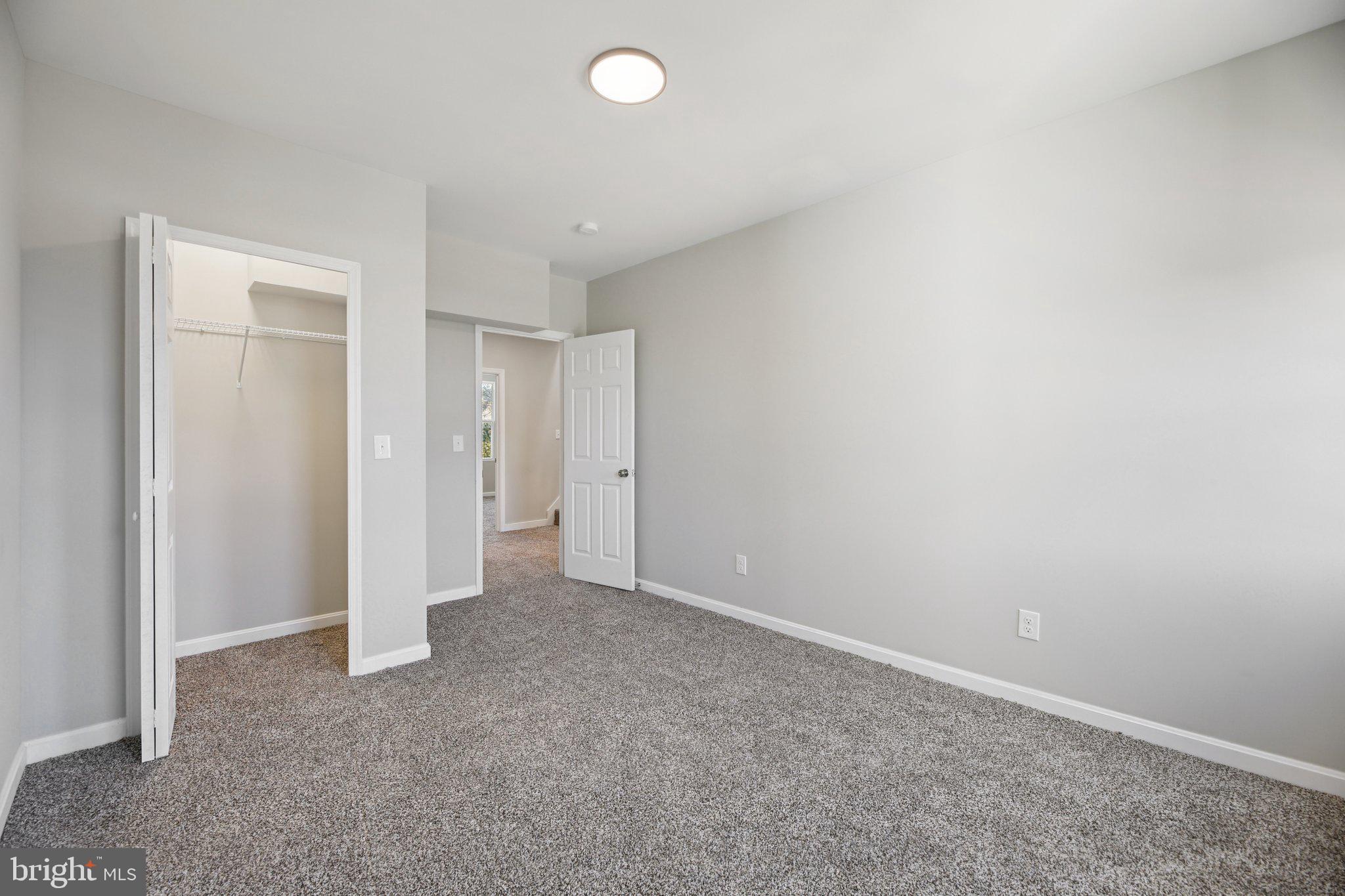 329 East University Parkway Baltimore, MD 21218 - Photo 17 of 38 a view of an empty room