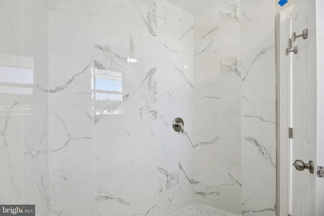 a view of a hallway with staircase