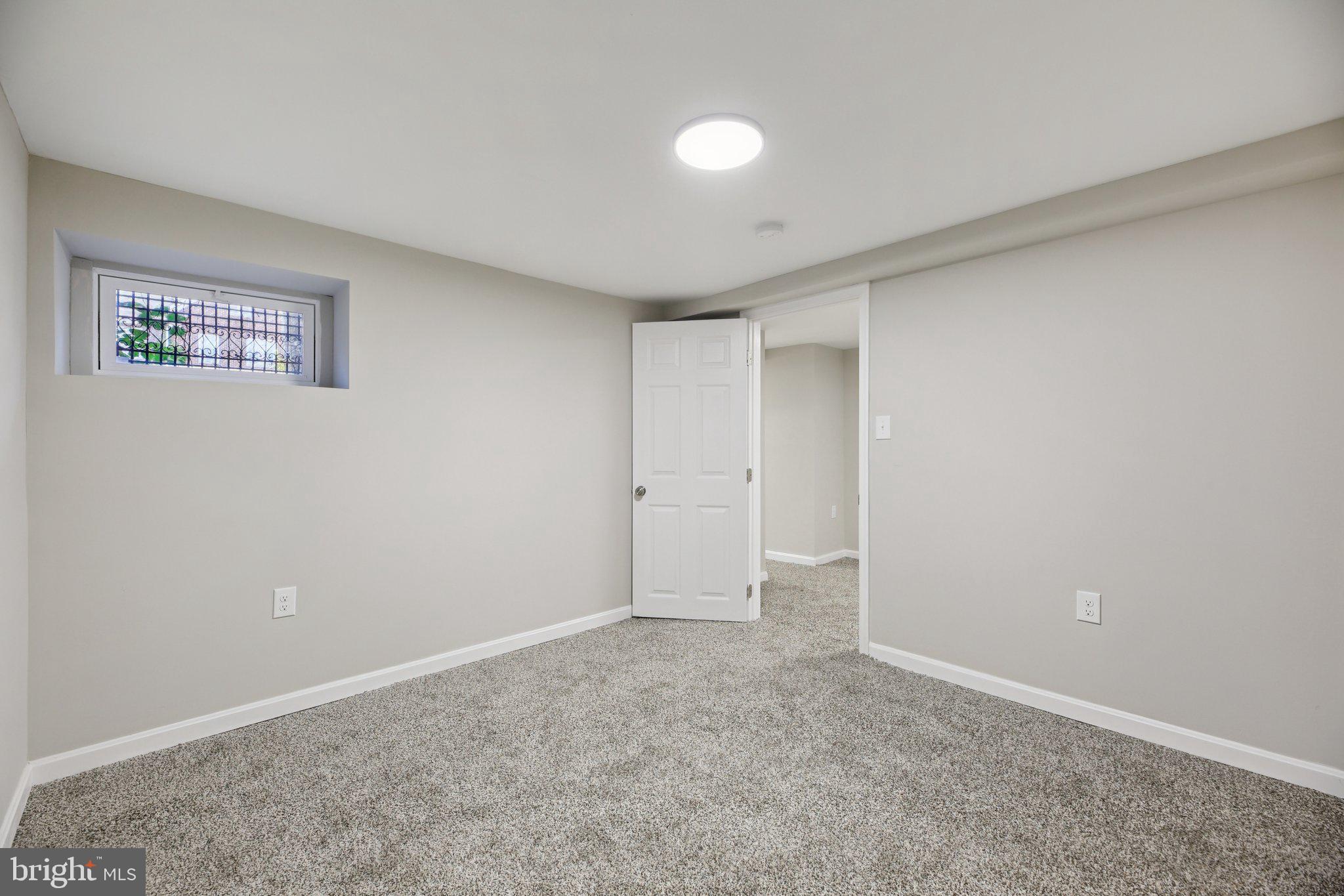 329 East University Parkway Baltimore, MD 21218 - Photo 33 of 38 a view of an empty room