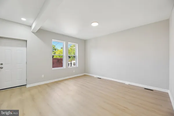 a view of an empty room and window