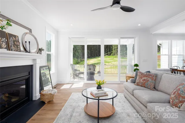 a bedroom with a bed and a potted plant
