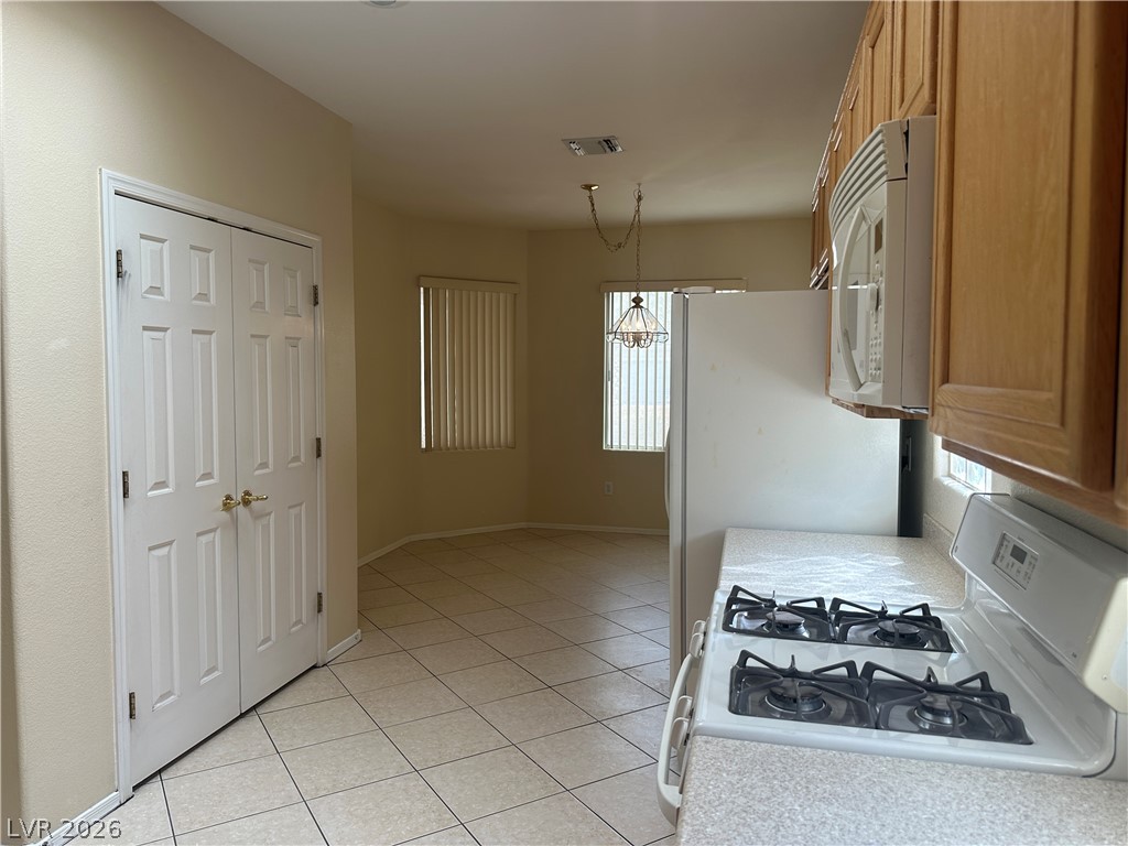3034 Canal Walk Road Henderson, NV 89052 - Photo 24 of 24 This spacious kitchen offers ample room for culinary endeavors and gatherings.