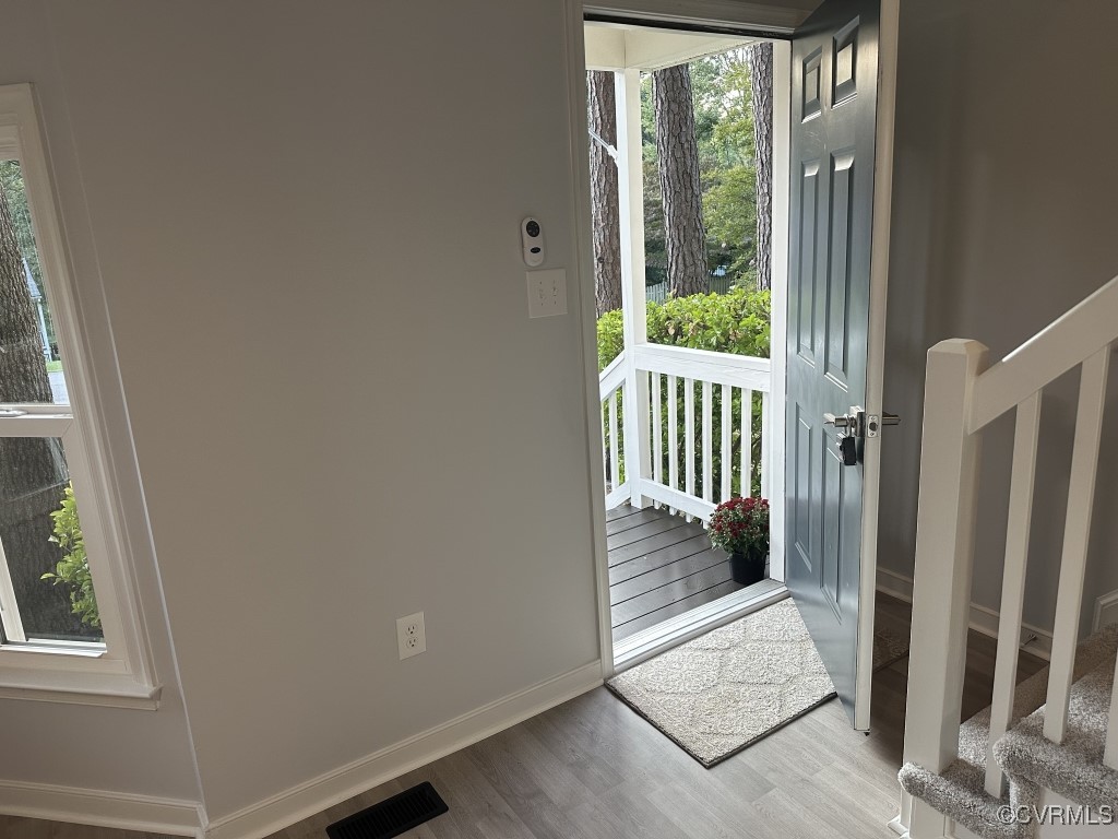 3023 Gregwood Road Midlothian, VA 23112 - Photo 3 of 17 a view of entryway with wooden floor and door