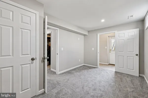 a storage room with washer and dryer