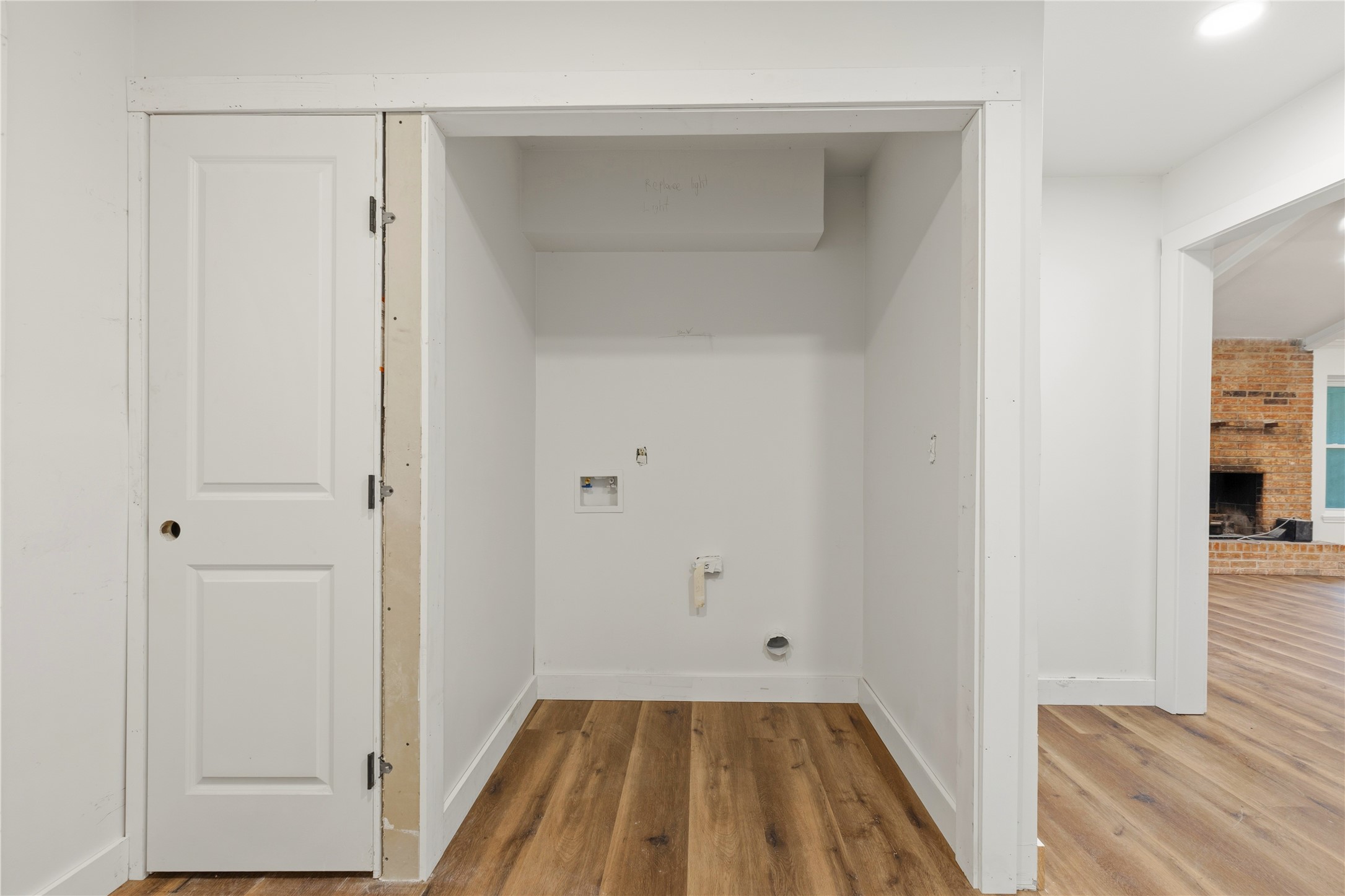 74 Robinson Road Huntsville, TX 77320 - Photo 15 of 33 a view of a room with wooden floor and bathroom
