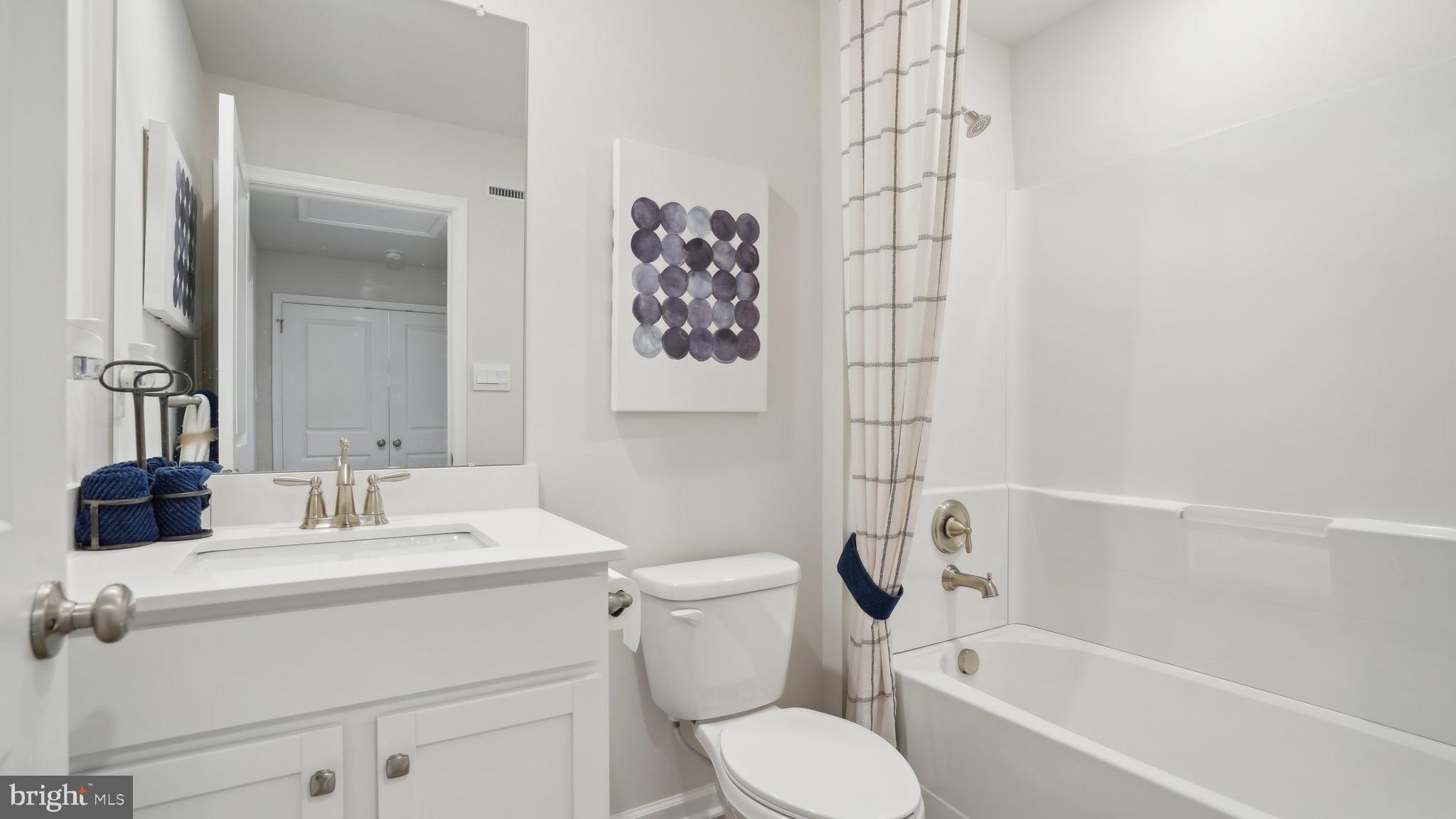 31 Alexander Way Westampton, NJ 08060 - Photo 10 of 14 a bathroom with a sink toilet and shower