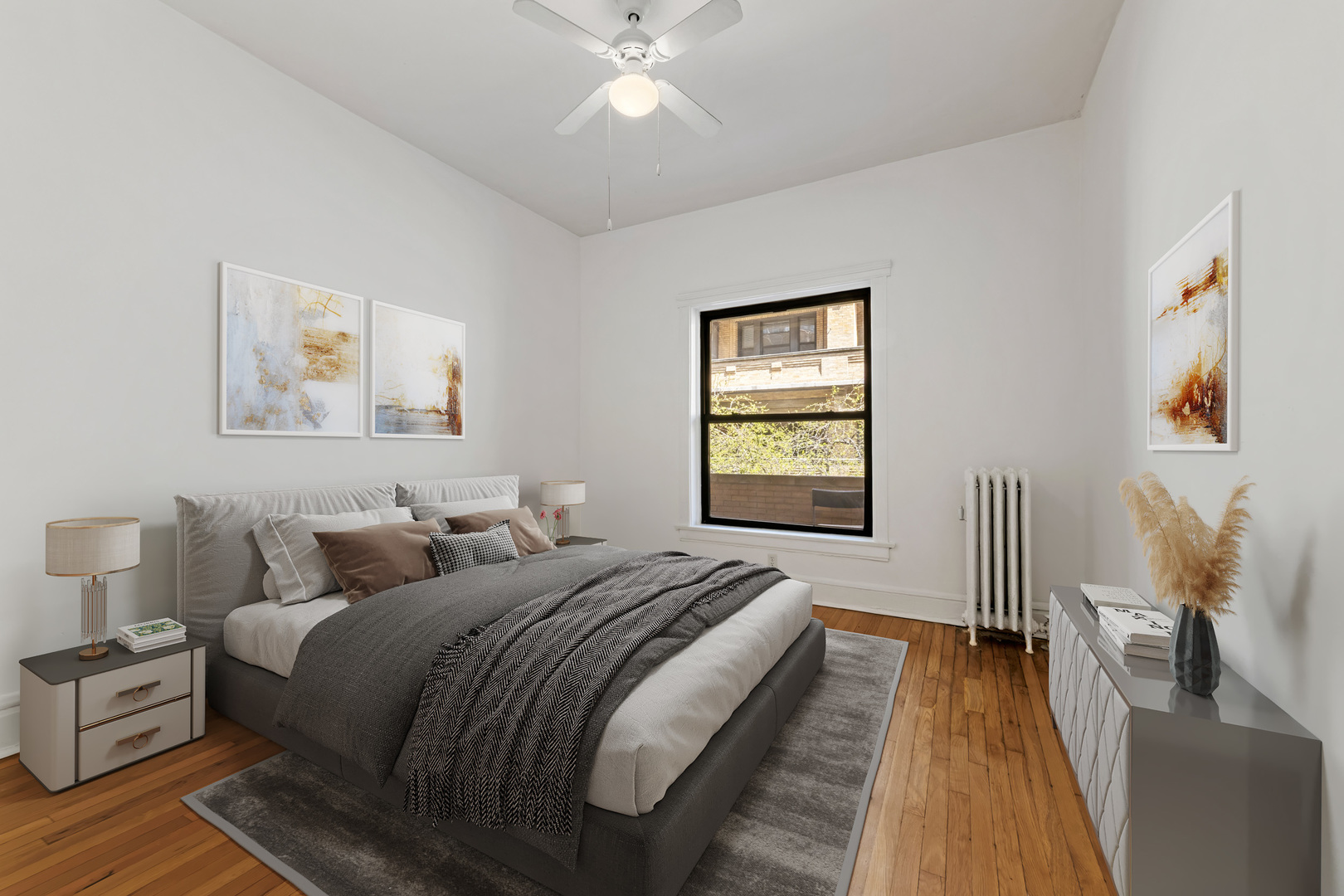 728 West Sheridan Road, Unit 2N Chicago, IL 60613 - Photo 10 of 18 a spacious bedroom with a bed and wooden floor