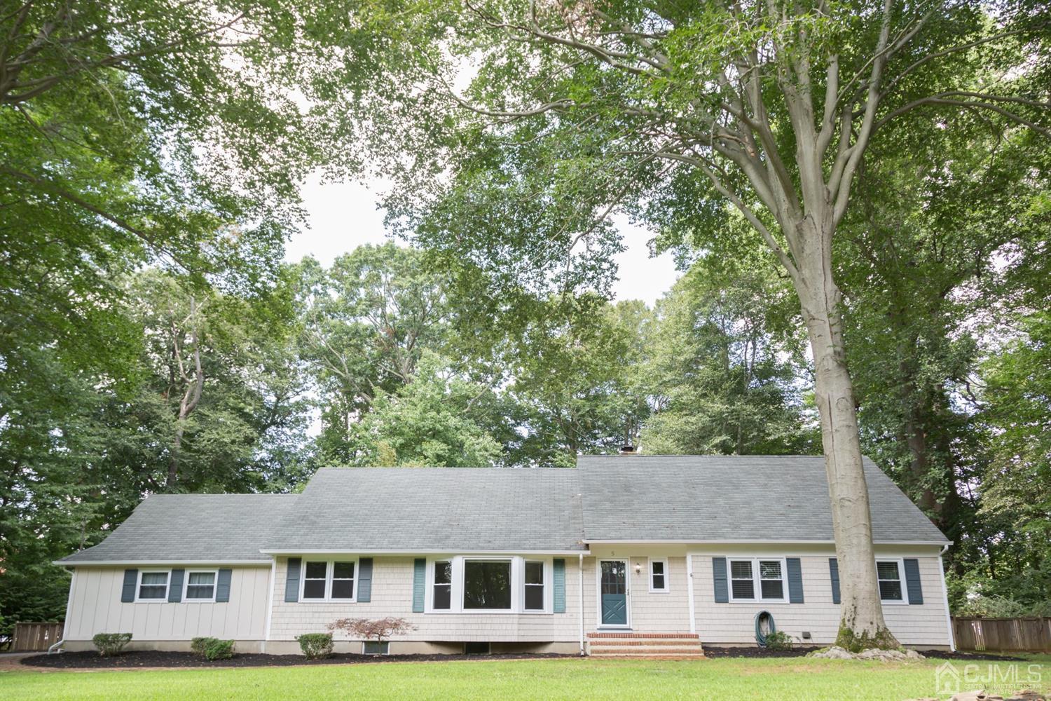 6 Coventry Square Holmdel, NJ 07733 - Photo 1 of 36 front view of house with a big yard